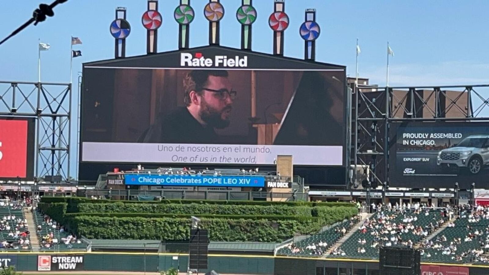 Brother David Marshall, a Dayton native and Chaminade Julienne graduate, performs his original song "One of Us" June 14 at Rate Field in Chicago in celebration of Pope Leo. CONTRIBUTED