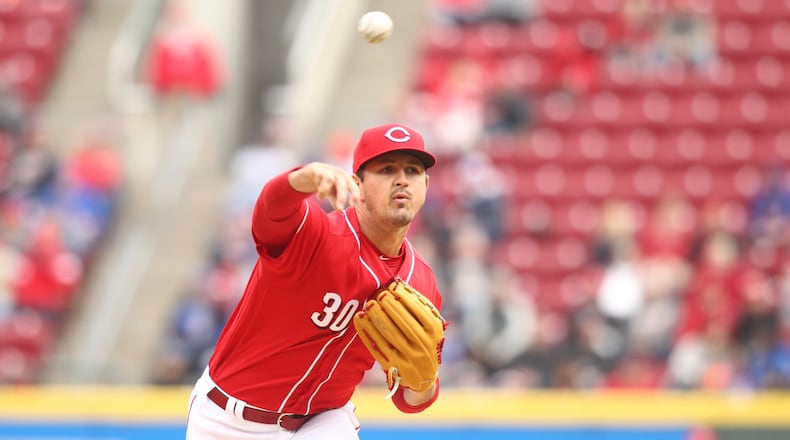 Reds starter Tyler Mahle pitches against the Cubs on Monday, April 2, 2018, at Great American Ball Park in Cincinnati. David Jablonski/Staff