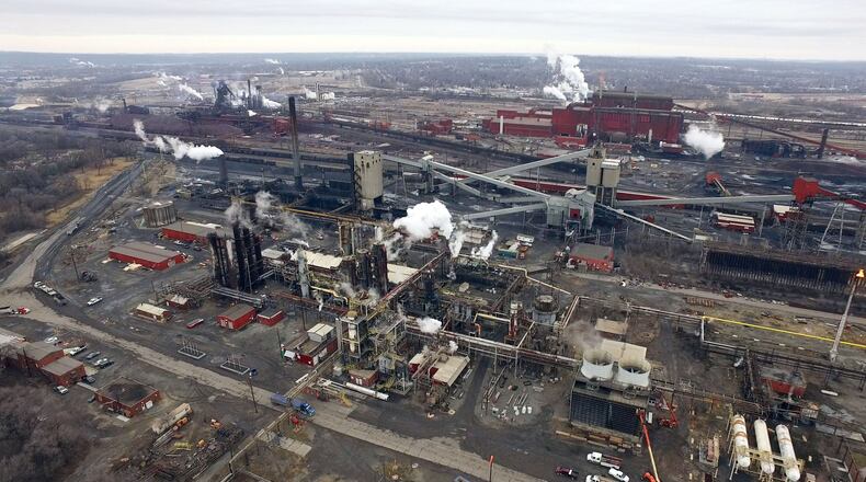 Aerial view of the AK Steel Middletown Works. The big steel producer covers more than 2,700 acres in the city to operate coke ovens, a blast furnace, hot strip mill and more than a dozen other steel production related processes. TY GREENLEES / STAFF
