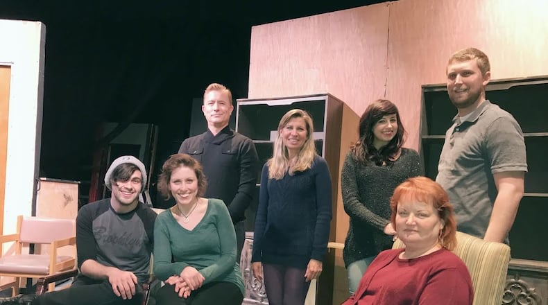 (left to right, front) Andrew Poplin, Kayla Graham, Cheryl Mellen, (left to right, back) John-Michael Lander, Cassandra Engber, Heather Atkinson, and Timothy Moore appear in the Dayton Theatre Guild’s production of the drama “Luna Gale” Jan. 20-Feb. 5. CONTRIBUTED