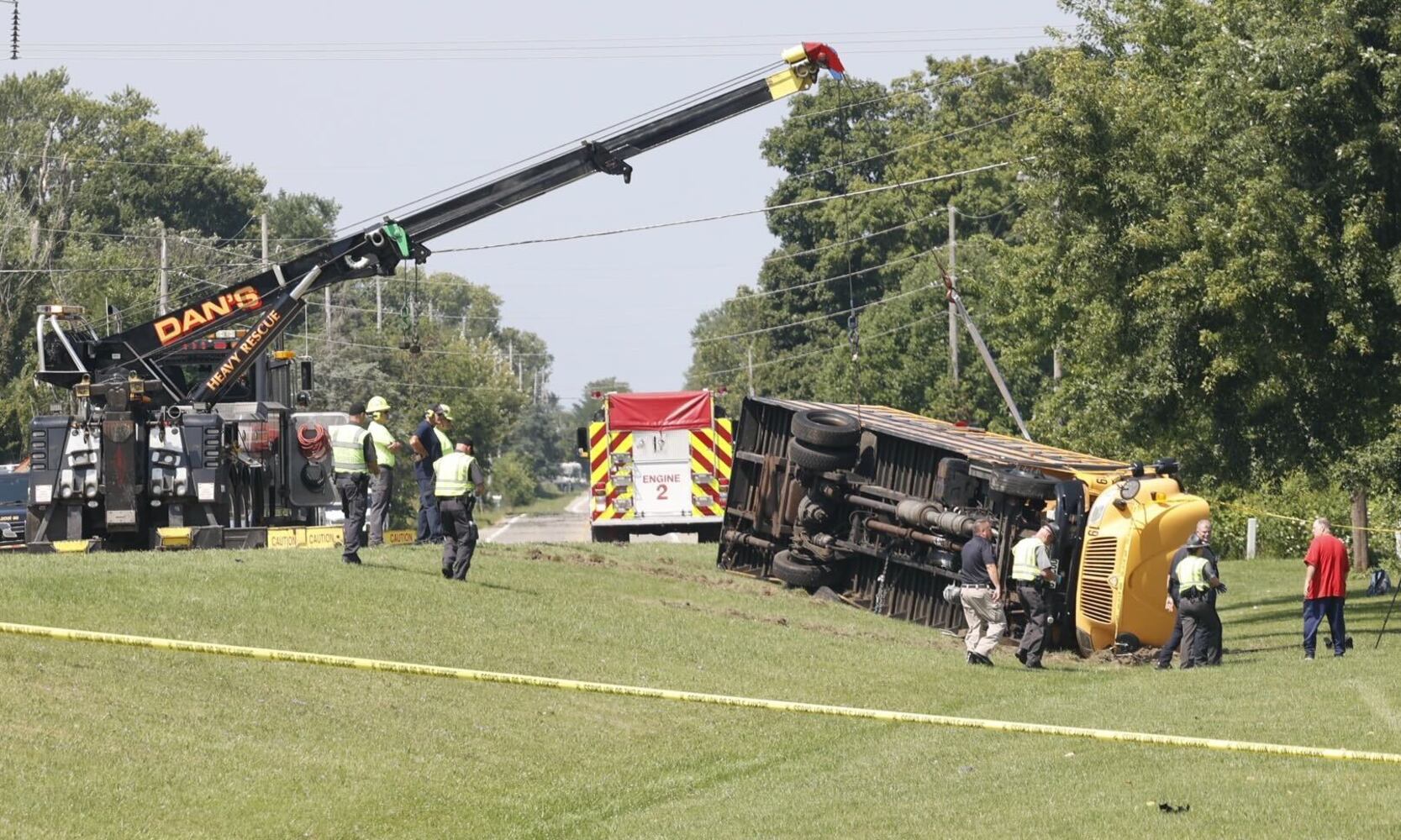 One killed after Northwestern school bus overturns in crash