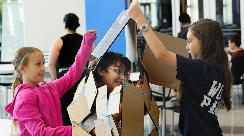 Working on a windball Thursday, June 13, 2024 at the first career camp for middle school students at the Greene County CTC are from left, Sophie Heiner, Elenanor Steiger and Brynn Filson. A total of 85 middle school students signed up for the camp. MARSHALL GORBY\STAFF
