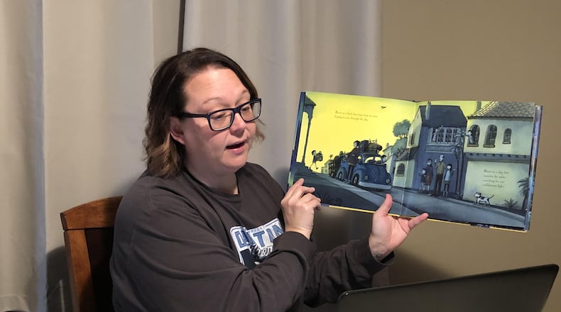 Erin Gross, counselor at Clearcreek Elementary, reads to her students from home via Google Meet. Contributed photo