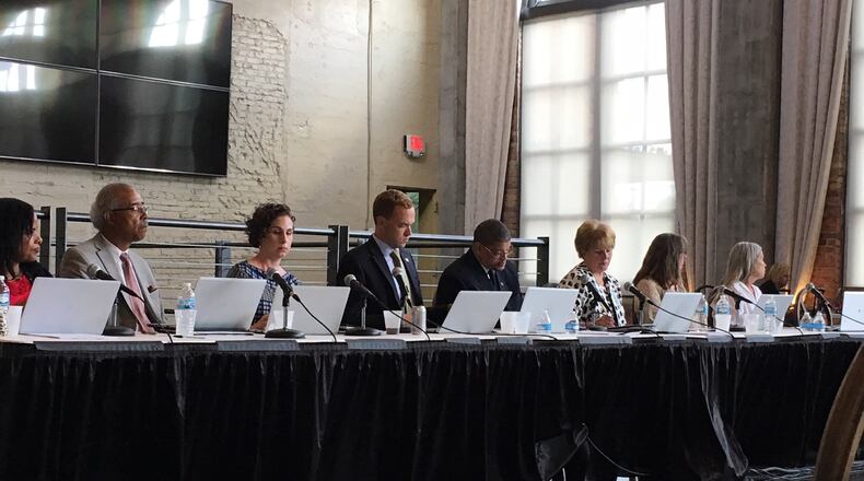 Dayton school board members met at The Steam Plant on East Third Street on Tuesday, Aug. 21, 2018. JEREMY P. KELLEY / STAFF