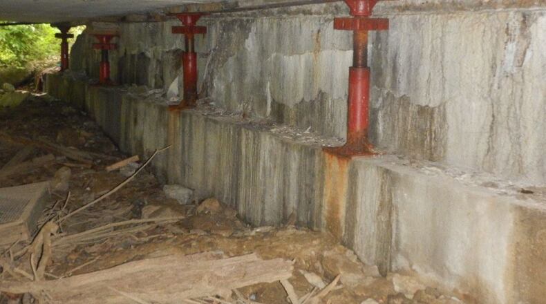 The end of the Lyons Road bridge over Holes Creek in Washington Twp. has been supported on temporary jacks for several years, according to the county. CONTRIBUTED