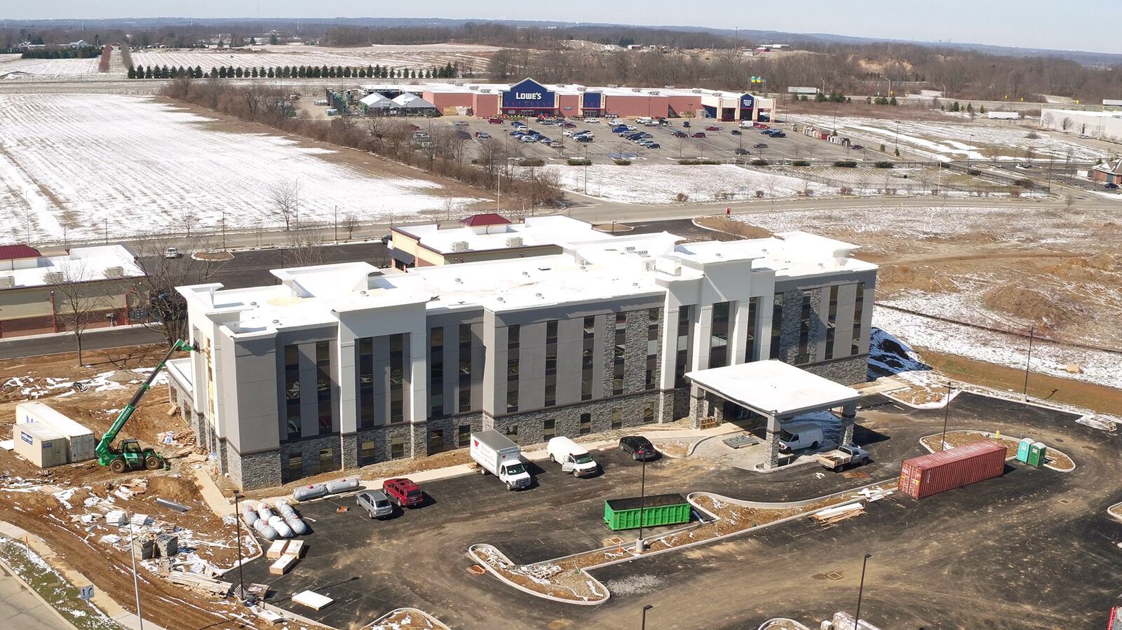 The new Hampton Inn and Suites is nearing completion in Xenia.  The 88-room hotel will offer amenities that American travelers will be accustomed to -- an indoor pool, conference space and lobby with an area for breakfast. Penn Station East Coast Subs is open for business on Hospitality Drive in Xenia.  The sub shop occupies one of two new retail storefront buildings constructed on Hospitality Dr. directly behind the Hampton Inn.   TY GREENLEES / STAFF