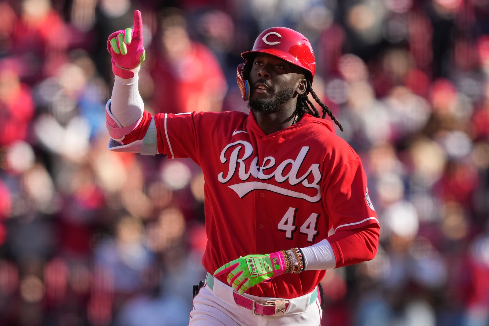 Cincinnati Reds' Elly de la Cruz celebrates hitting a solo home run as he rounds the bases during the fifth inning of a baseball against the Boston Red Sox in Cincinnati, Saturday, March 28, 2026. (AP Photo/Carolyn Kaster)