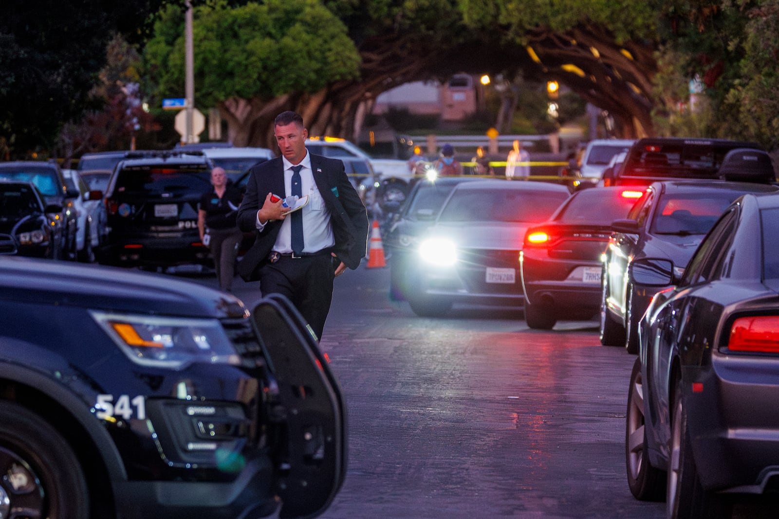 Law enforcement investigate the scene on Bay Street in Santa Monica, Calif., Friday, July 18, 2025, after an explosion at Biscailuz Training Facility killed three deputies. (Gina Ferazzi/Los Angeles Times via AP)