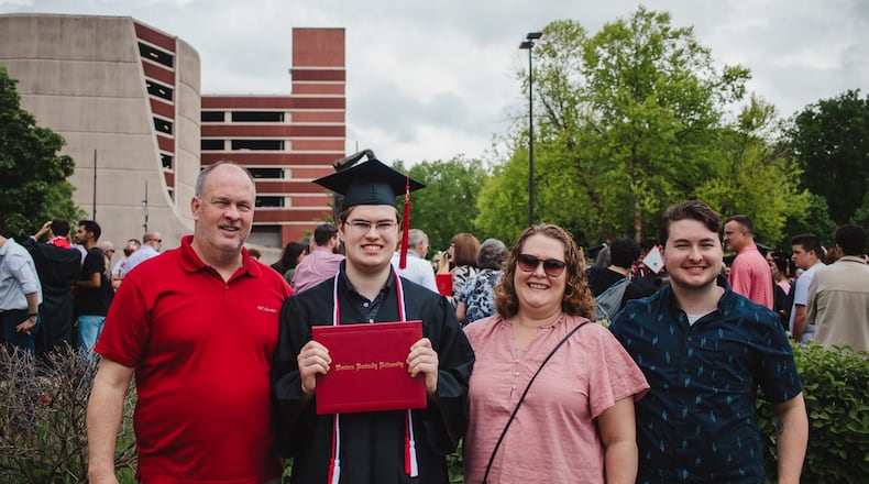 Hunter Garrett (second from left) at his graduation from Western Kentucky University in May of 2022. He is surrounded by (left to right) his parents, Nolan and Kelly, and brother Andrew Garrett. CONTRIBUTED