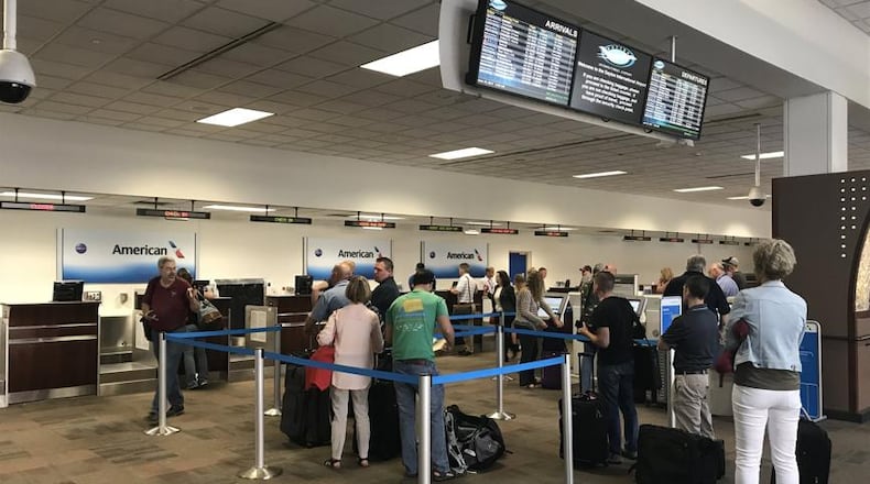 Passengers line up at Dayton International in busier days.