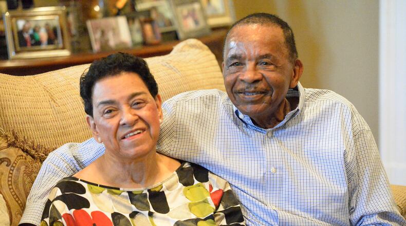 William and Omega Bell of Charlotte laugh as they talk about how they reunited after decades apart, on Monday, October 16, 2017. They first met and fell in love in 1952, as teenagers. But after William moved from NC to Maryland for a job, he and Omega fell out of contact. Eventually, they both got married to other people. Eventually, Omega got divorced and William's wife passed away. And then a twist of fate led to their paths crossing in February of 2016, for the first time in more than 60 years. A spark was reignited. Within months, they were engaged, and just last Sunday, Oct. 7, William and Omega -- who are now in their 80s and figured they'd never find love again -- were married. (David T. Foster III/Charlotte Observer/TNS)