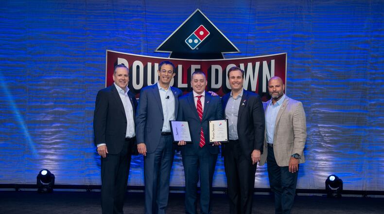 Pictured from left to right: Joe Jordan, COO & President , Domino’s U.S., Russell Weiner, Chief Executive Officer, Domino’s, Chris Krueger, Domino’s U.S. Supervisor of the Year, Art D’Elia, EVP, International, Domino’s and Frank Garrido, EVP, U.S. Operations and Support, Domino’s. CONTRIBUTED