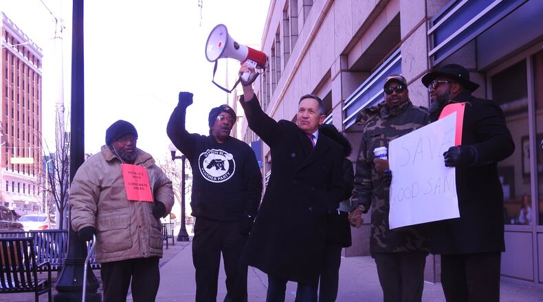 Ohio Democratic gubernatorial hopeful Dennis Kucinich rallied with protesters outside Premier Health headquarters in downtown Dayton Tuesday against the announced closure of Good Samaritan Hospital in Dayton. BRAD LEE/STAFF