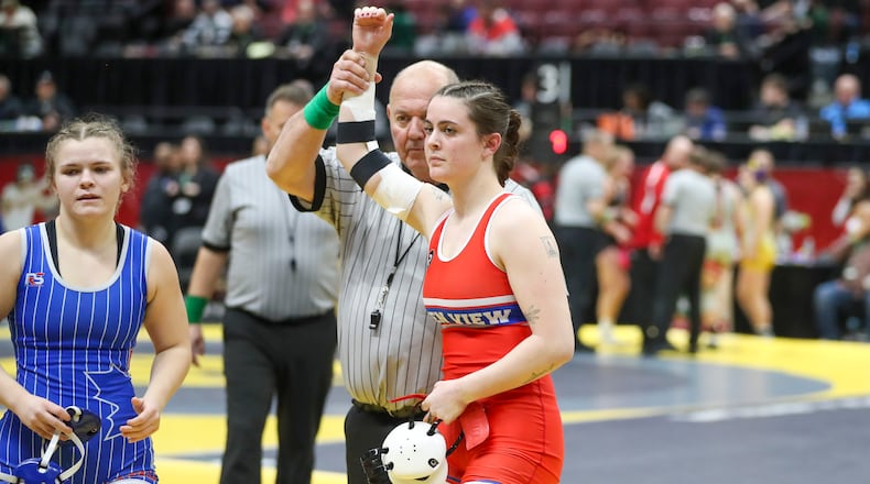 Greeneview High School's Eve Matt has her arm raised into the air after winning a match at the Ohio High School Athletic Association's state wrestling championships on Friday, March 7 at the Schottenstein Center in Columbus. Dave Thompson/CONTRIBUTED