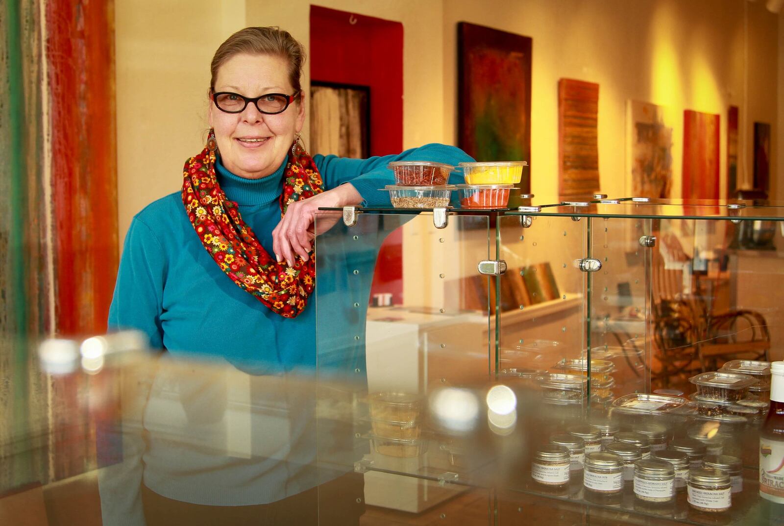 Ulrike Massey in her store Spice Paradise, 8 Brown St. in the Oregon District, started under the Activated Spaces Pop-Up project. JIM WITMER/STAFF