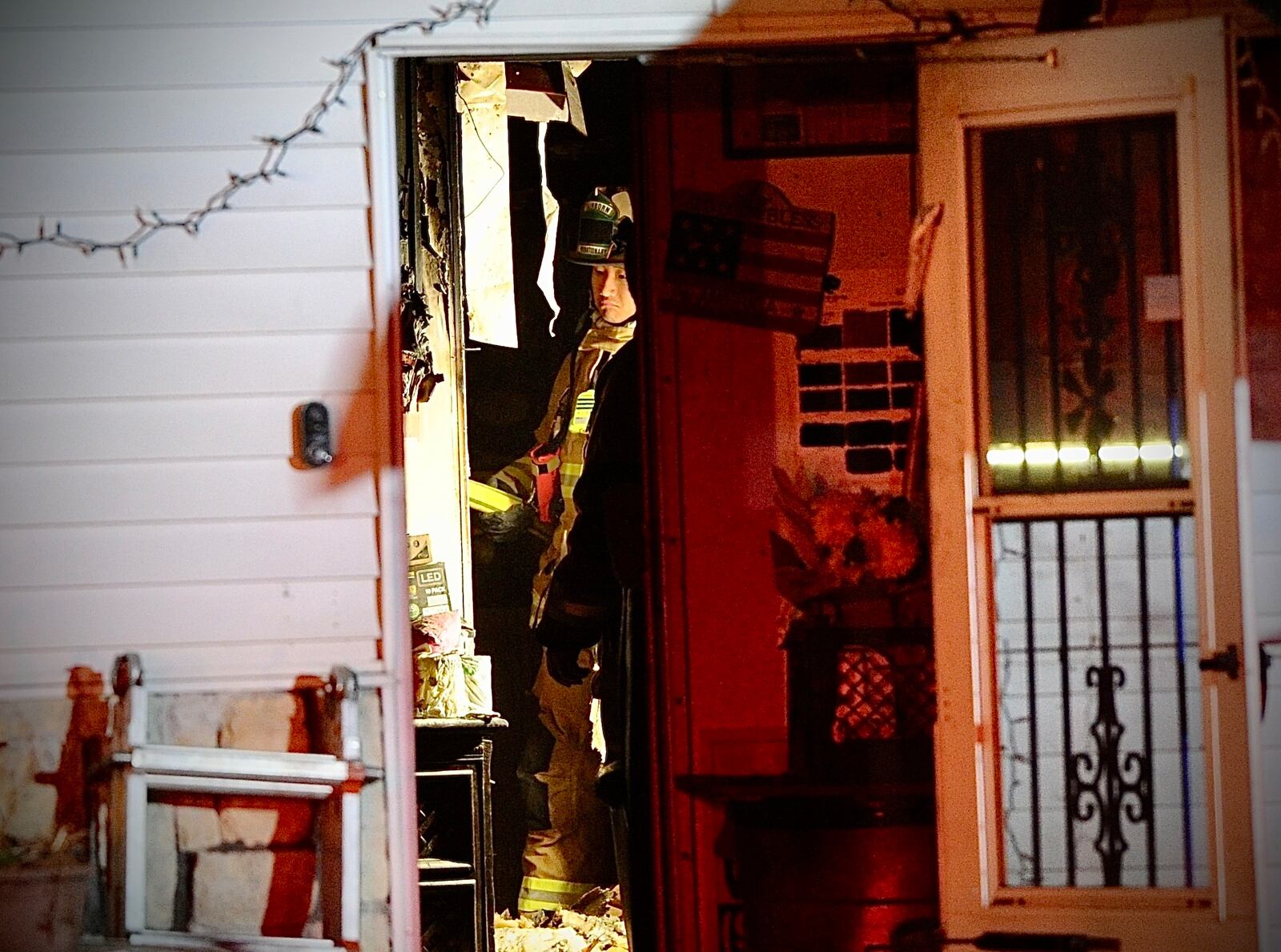 A Fairborn firefighter was injured and a family dog killed in a house fire Monday night, Nov. 21, 2022, on Cleary Drive. MARSHALL GORBY/STAFF