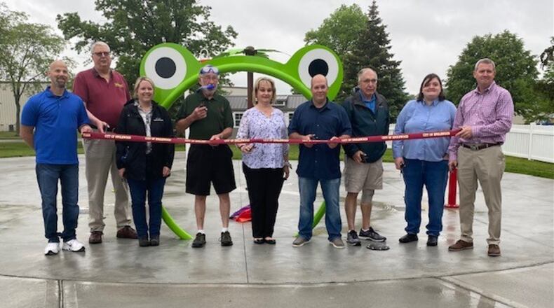 Englewood city council and employees gathered to officially open their new splash pad at Centennial Park.