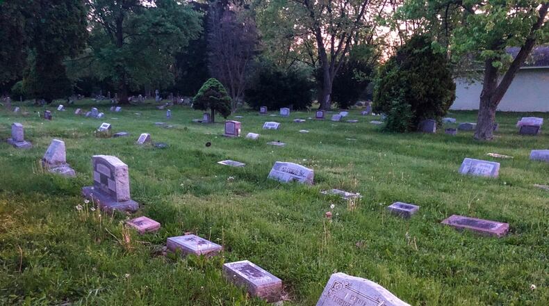 A group of volunteers plan to meet at Greencastle Cemetery in Dayton twice a month to help keep the grounds tidy. STAFF PHOTO / SCOTT KESSLER