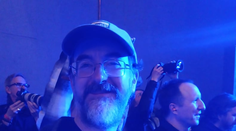 Chris Wettle, Dayton music scene archivist, before a show with his trusty TASCAM field recorder. JENNIFER OLT/CONTRIBUTED