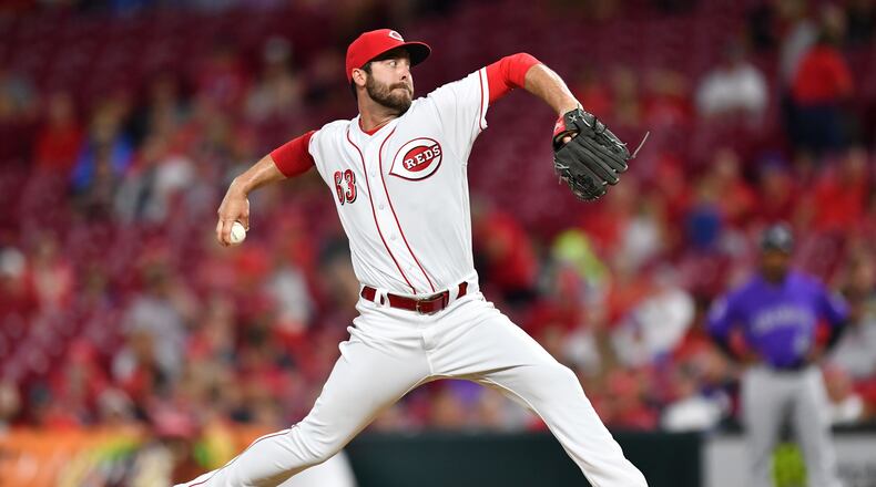 CINCINNATI, OH - JUNE 5: Dylan Floro #63 of the Cincinnati Reds pitches in the eighth inning against the Colorado Rockies at Great American Ball Park on June 5, 2018 in Cincinnati, Ohio. Colorado defeated Cincinnati 9-6. (Photo by Jamie Sabau/Getty Images)