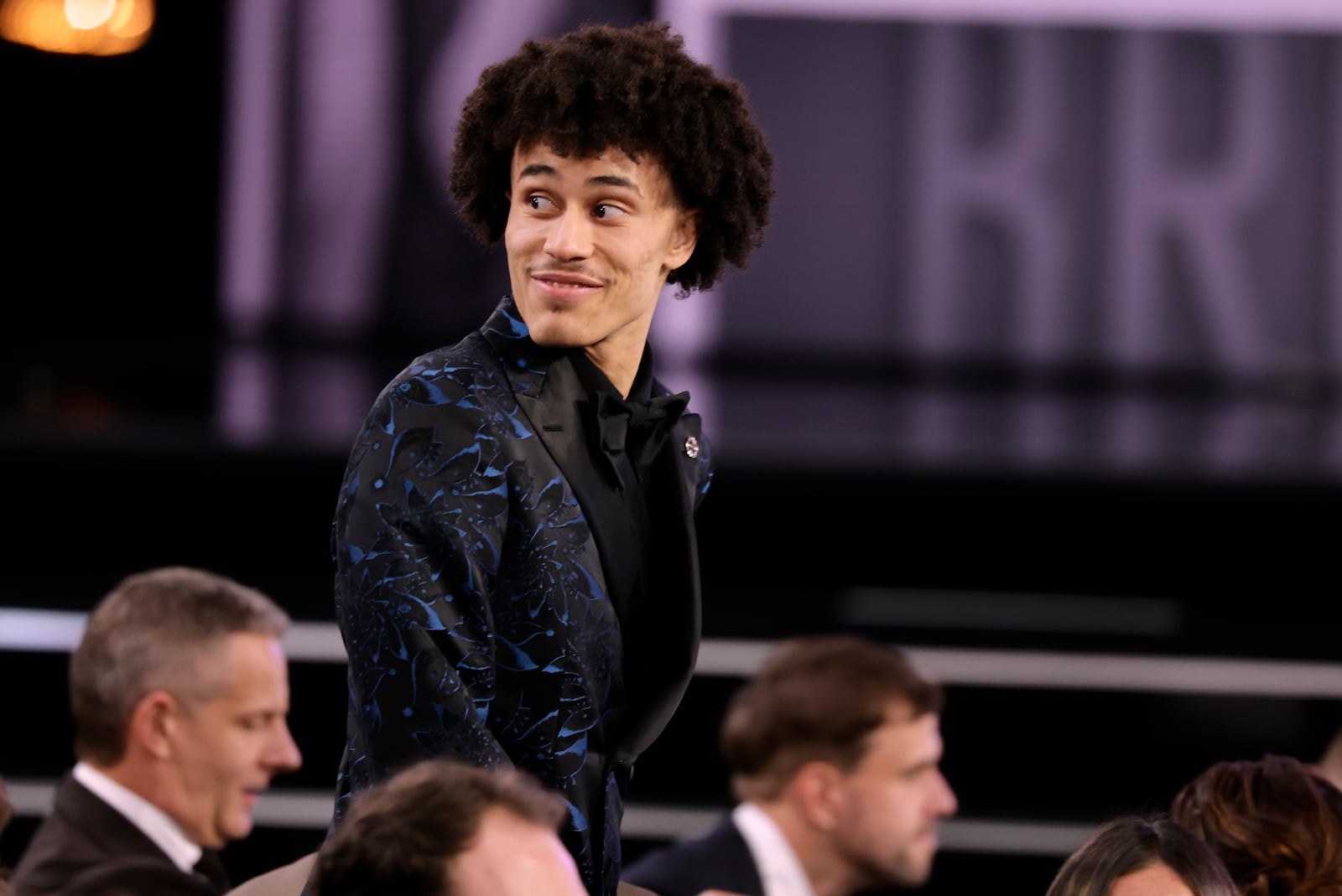 Nolan Traore reacts after being selected 19th by the Brooklyn Nets in the first round of the NBA basketball draft, Wednesday, June 25, 2025, in New York. (AP Photo/Adam Hunger)