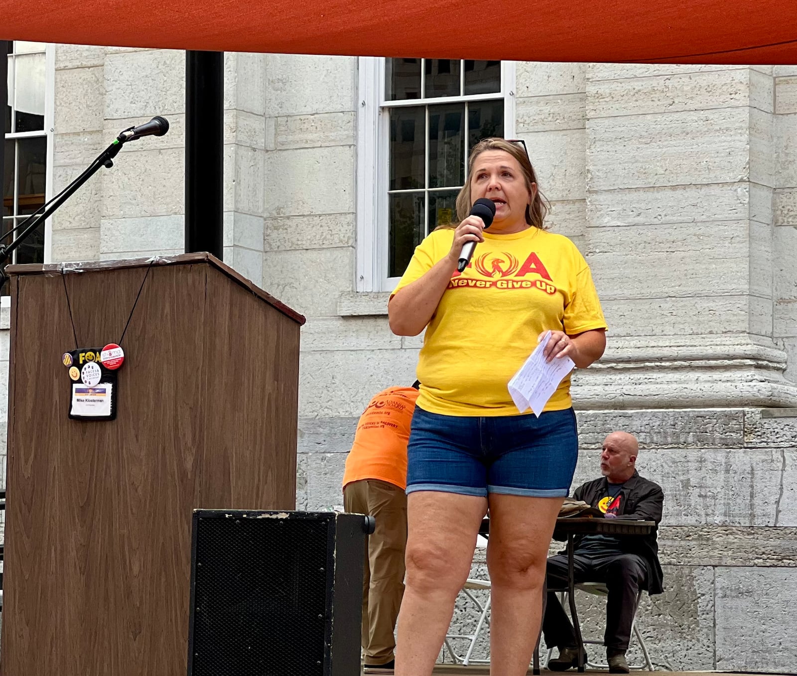 Angie Todd, founder of the Onslow County, North Carolina, chapter of Families of Addicts (FOA), spokes during Sunday's rally. AIMEE HANCOCK/STAFF