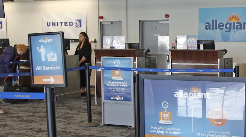 Check-in for Allegiant is closed on Tuesday, Wednesday and Saturday when the airline does not offer flights from Dayton. The loss of some additional Allegiant flights from Dayton is adding to the decline of passengers using the Dayton Airport over the past several years. TY GREENLEES / STAFF