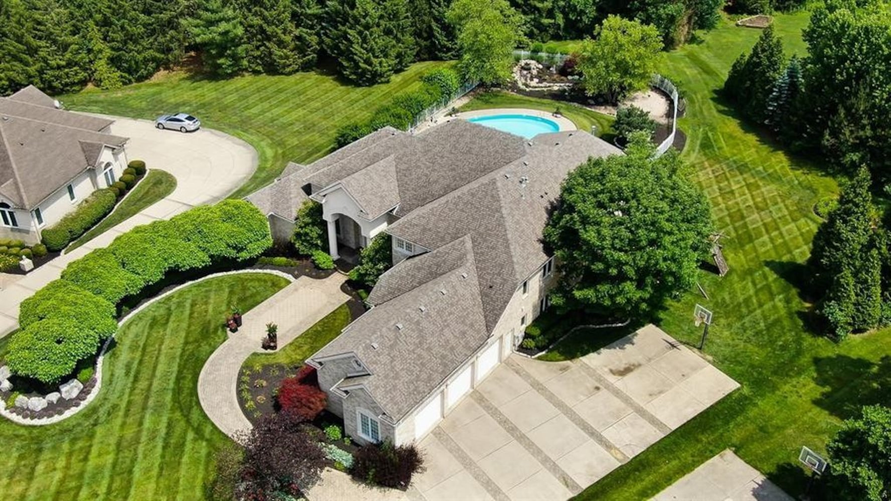 Photos: $1M luxury home listed has waterfall, swimming pool and kitchen to die for