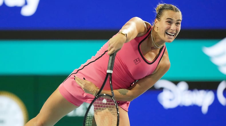Aryna Sabalenka serves to Elena Rybakina of Kazakhstan during a semifinal match at the Miami Open tennis tournament, Thursday, March 26, 2026, in Miami Gardens, Fla. (AP Photo/Marta Lavandier)