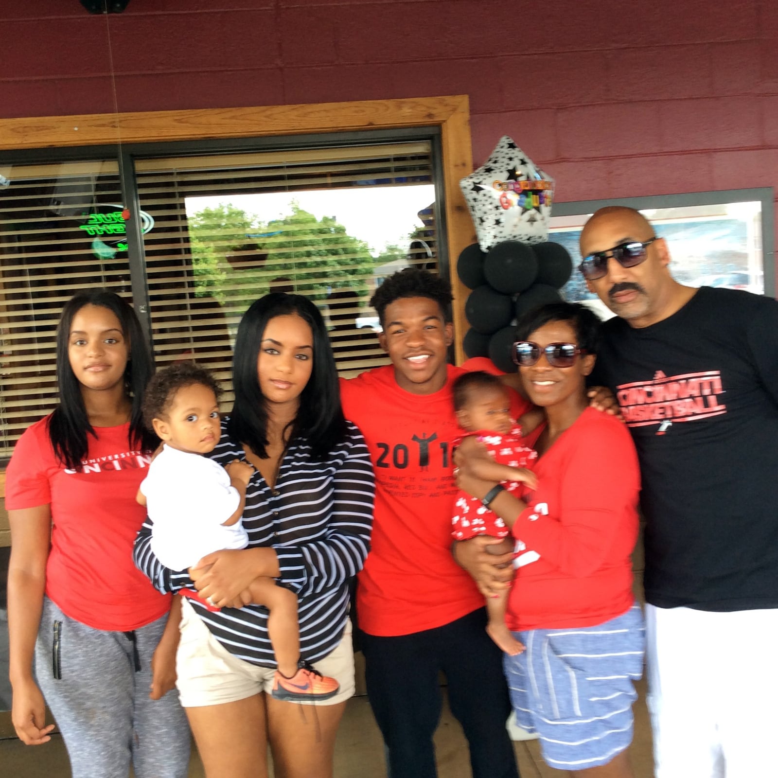 Demarus Crawford-White and her family in 2018. Left to Right Zarina, Zarea (holding son Lorenzo), Zachary, Crawford-White (holding granddaughter Ava) and Michael White.