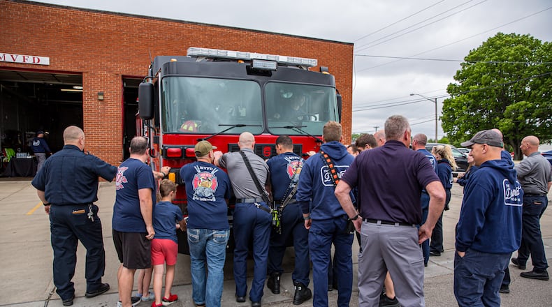 Miami Valley Fire District firefighters and city of Miamisburg officials participated in a traditional “push-in” ceremony Tuesday, May 27, at Station 55 at 5204 N. Springboro Pike in Moraine.
The ceremony dates back to the days of horse-drawn equipment when members had to push the equipment into the bay after each call. CONTRIBUTED