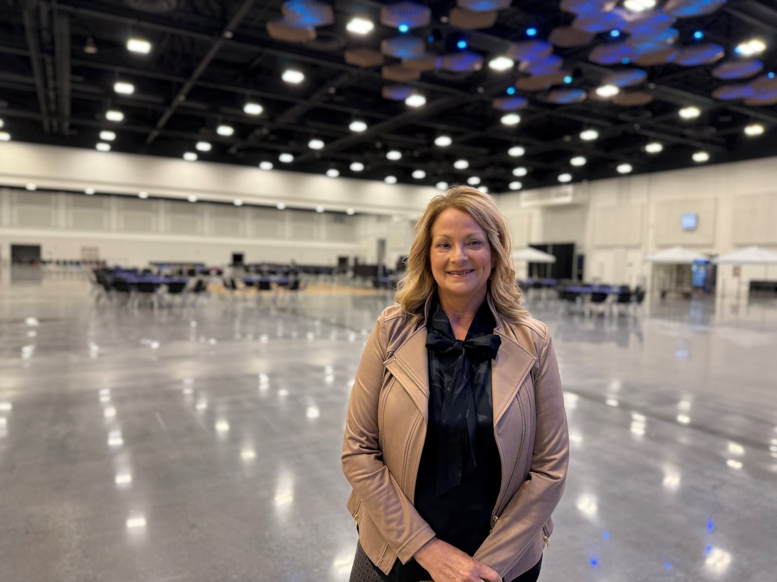 Pam Plageman, executive director and CEO of the Montgomery County Convention Facilities Authority, in an exhibit hall in the newly renovated facility. CORNELIUS FROLIK / STAFF