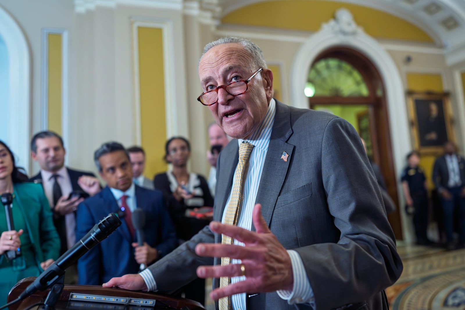 Senate Minority Leader Chuck Schumer, D-N.Y., speaks with reporters as the Senate holds its first procedural vote on Emil Bove's nomination for the 3rd Circuit Court of Appeals, at the Capitol in Washington, Tuesday, July 22, 2025. (AP Photo/J. Scott Applewhite)