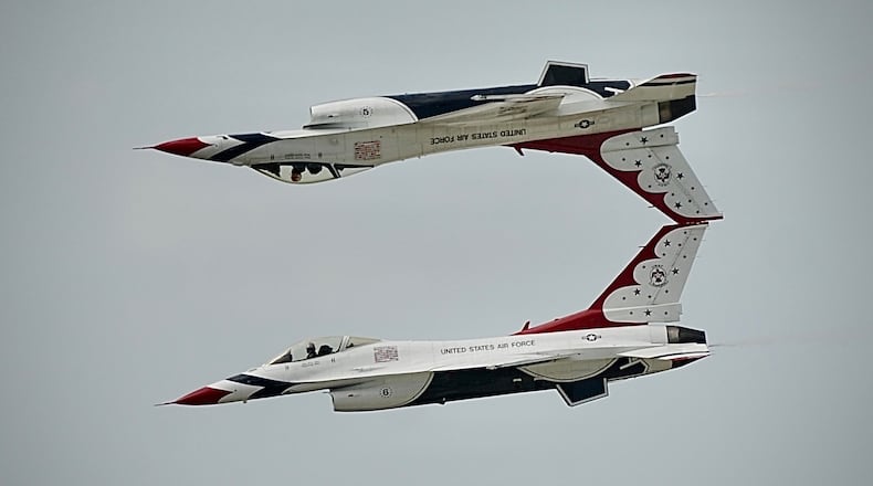 The U.S. Air Force Thunderbirds fly at the Dayton Air Show Sunday, July 23. MARSHALL GORBY/STAFF
