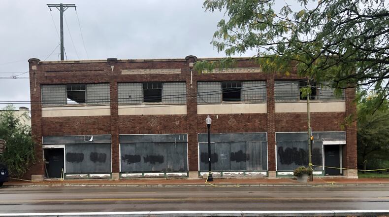 The Gem City Ice Cream Co. building, the site of the Wright brothers' first bike shop, at 1005 W. Third St. The city of Dayton wants to demolish the property, which officials say is a nuisance. CORNELIUS FROLIK / STAFF