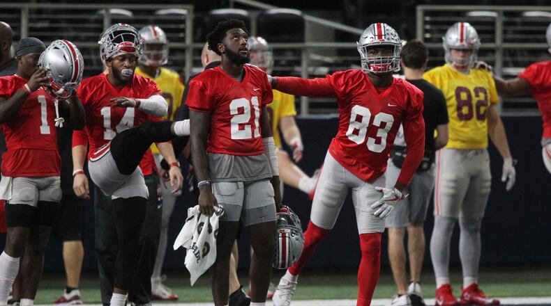 Ohio State’s Parris Campbell (21) and Terry McLaurin (83) stretch during practice at AT&T Stadium on Tuesday, Dec. 26, 2017, in Arlington, Texas. David Jablonski/Staff