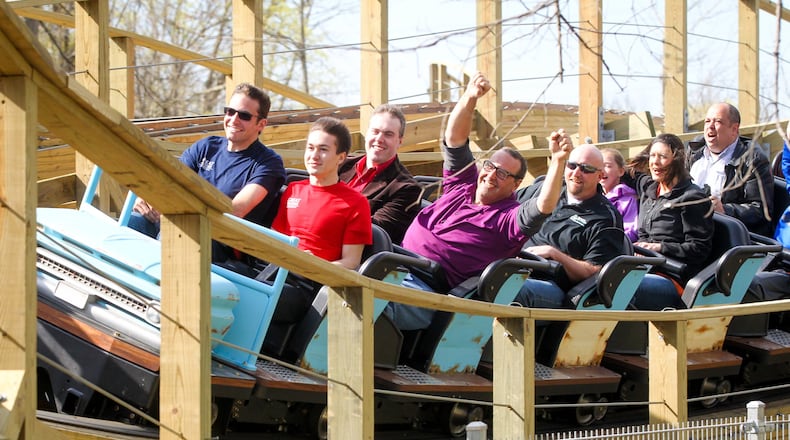 Ride enthusiasts enjoy a ride on the wooden roller coaster, Mystic Timbers, at Kings Island, during a preview of the attraction Thursday, Apr. 13, 2017. The ride is among 11 roller coaster featured at the 364-acre amusement park, which opened in 1972. GREG LYNCH / STAFF