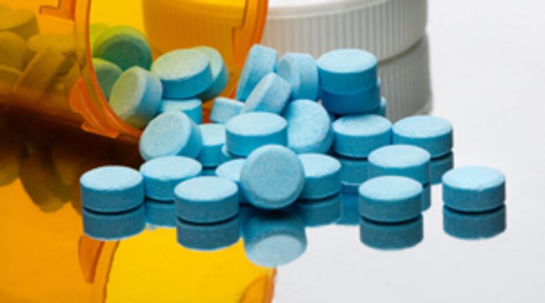 Prescription bottle with pills