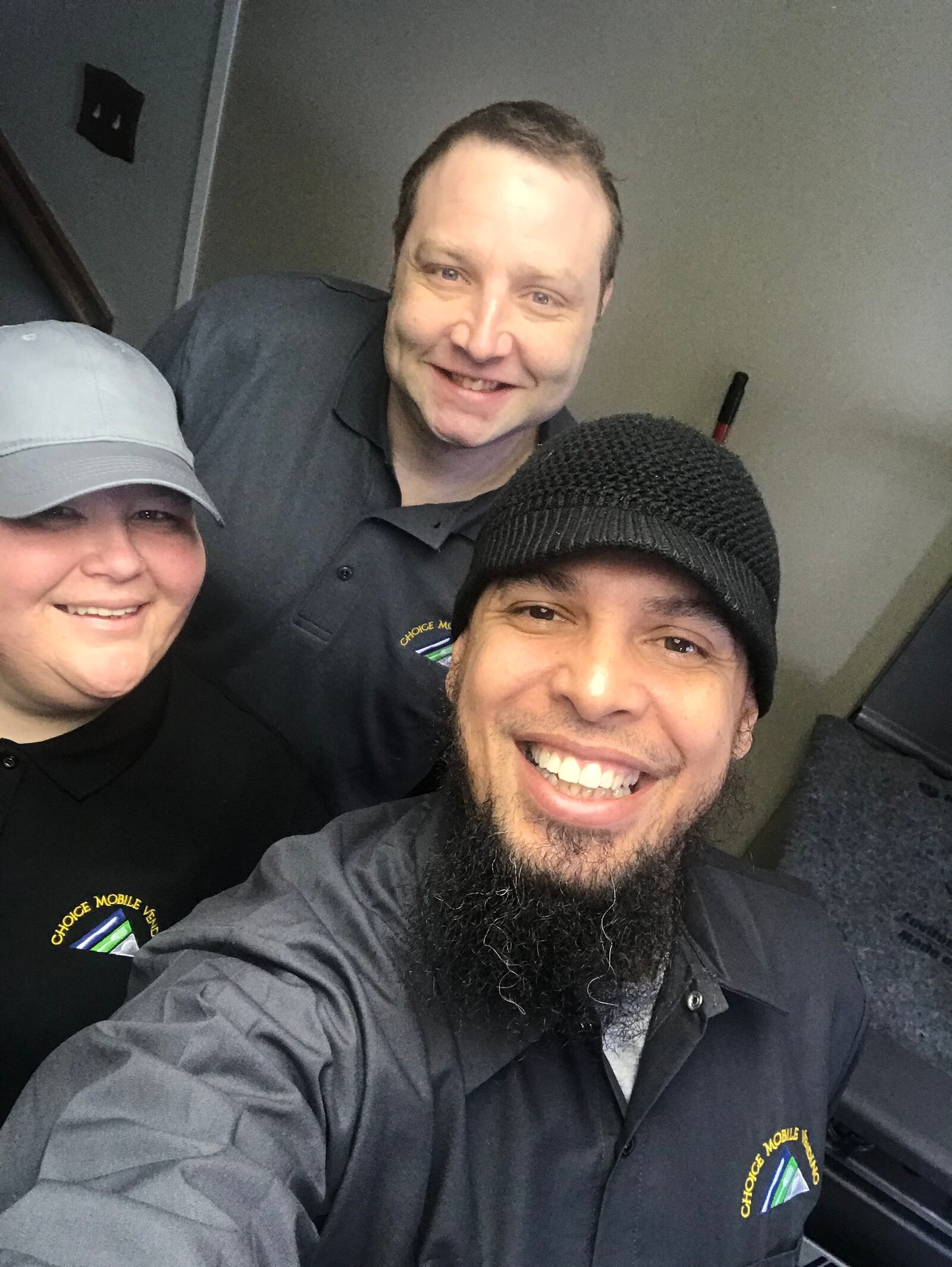 Joel Farquhar, pictured in the middle, owned Mega-bites food truck created the food menu for the Rolling Oasis and Rolling Oasis Hop Off before passing away March 20. PHOTO CONTRIBUTED BY HEATHER SCOTT