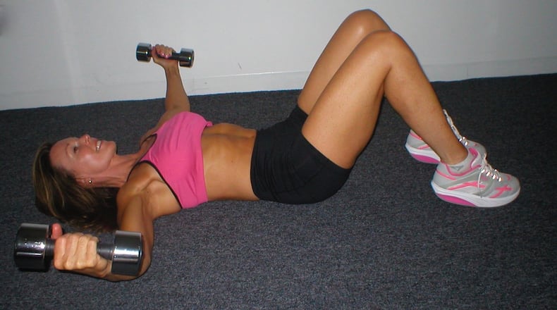 Lower arms until level with shoulders or chest. CONTRIBUTED