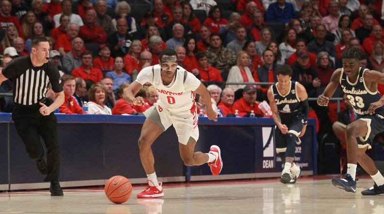 Dayton's Rodney Chatman chases a loose ball in the first half against Charleston Southern on Saturday, Nov. 16, 2019, at UD Arena.