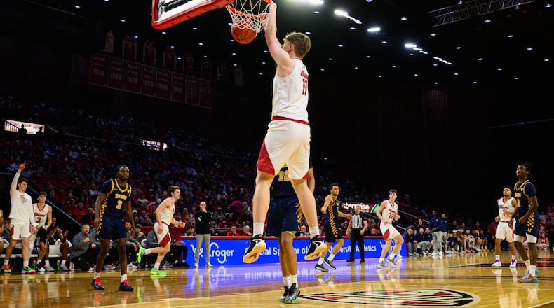 Miami University's Almar Atlason dunks the ball during their game against Toledo on Tuesday, March 3, 2026 at Millett Hall. The RedHawks won 74-72. JEREMY MILLER / CONTRIBUTED PHOTO