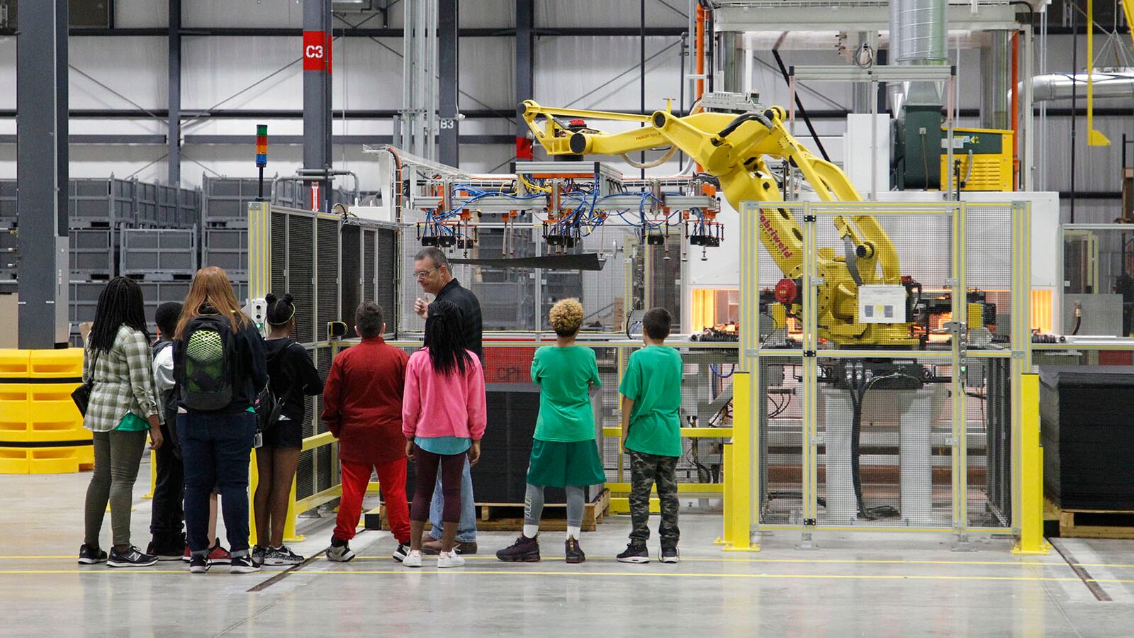 WATCH: Students tour new auto parts plant for Manufacturing Day