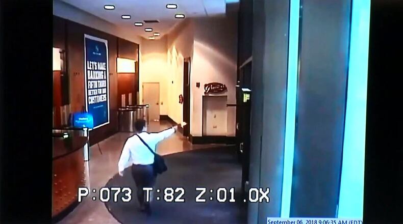 Cincinnati Police Chief Eliot Isaac said Omar Santa-Perez, 29, walked into the Fifth Third Center downtown building dressed in business attire and holding a 9 mm handgun and a briefcase stuffed with 200 rounds of ammunition when he opened fire at 9:06 a.m. Thursday, Sept. 6, 2018.