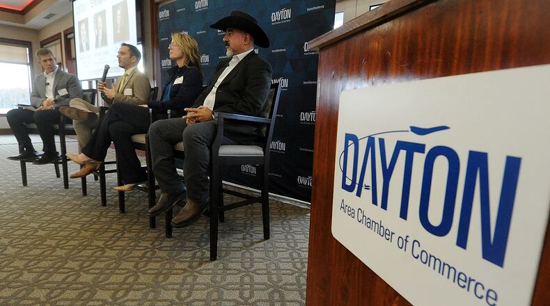 Jeffrey Dice, left, president of Moraine-based Winsupply, led a panel of area entrepreneurs Friday, Nov. 10, 2023 with Zachary Kiehl, president and CEO of VigiLife, Errin Siske, owner and creative director of Spark Space Creative and Ayman Salem, president and owner of Xenia’s Material Resources, LLC, at the
Dayton Area Chamber of Commerce Breakfast Briefing and Entrepreneurial Award ceremony in Kettering. MARSHALL GORBY\STAFF