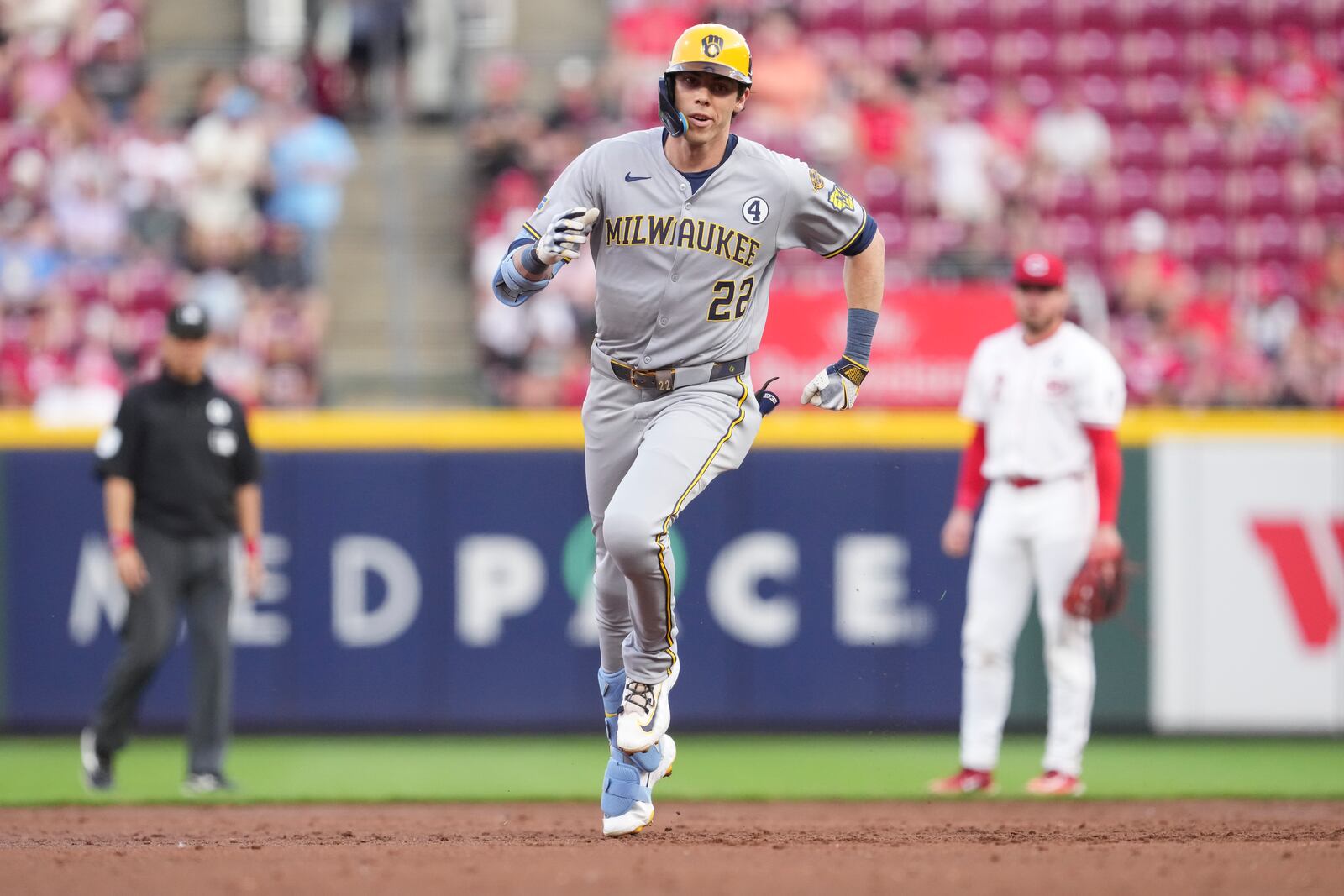 Milwaukee Brewers' Christian Yelich rounds the bases after hitting solo home run during the third inning of a baseball game against the Cincinnati Reds, Monday, June 2, 2025, in Cincinnati. (AP Photo/Jeff Dean)