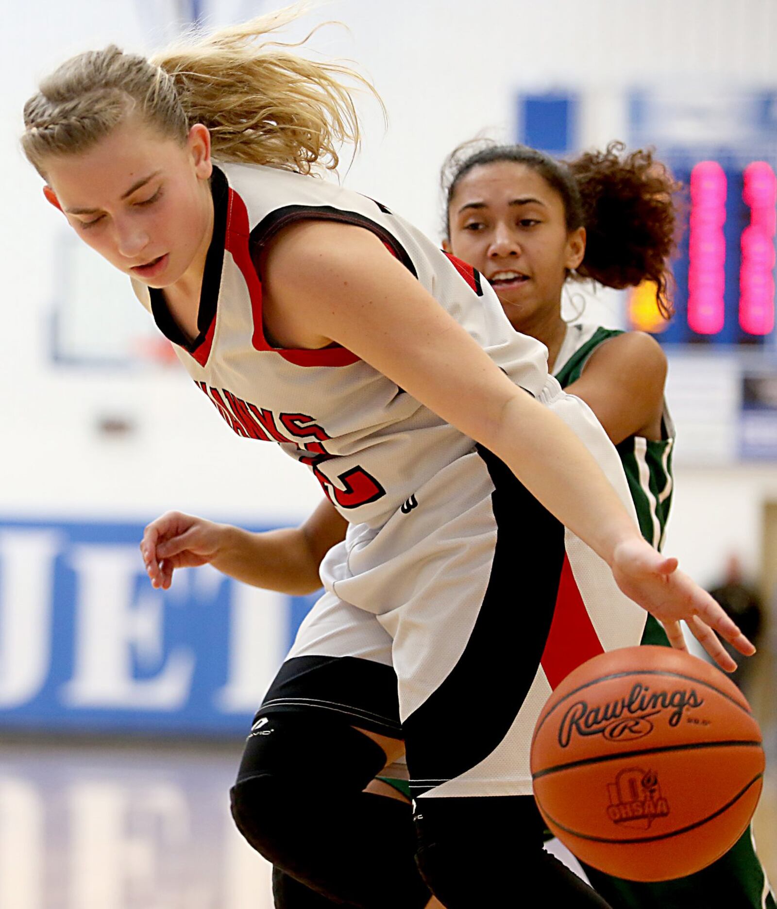 Madison guard Jackie Kovscek grabs a loose ball in front of Bethel guard Kayla Grable on Saturday during Division III sectional play at Franklin Monroe. CONTRIBUTED PHOTO BY E.L. HUBBARD