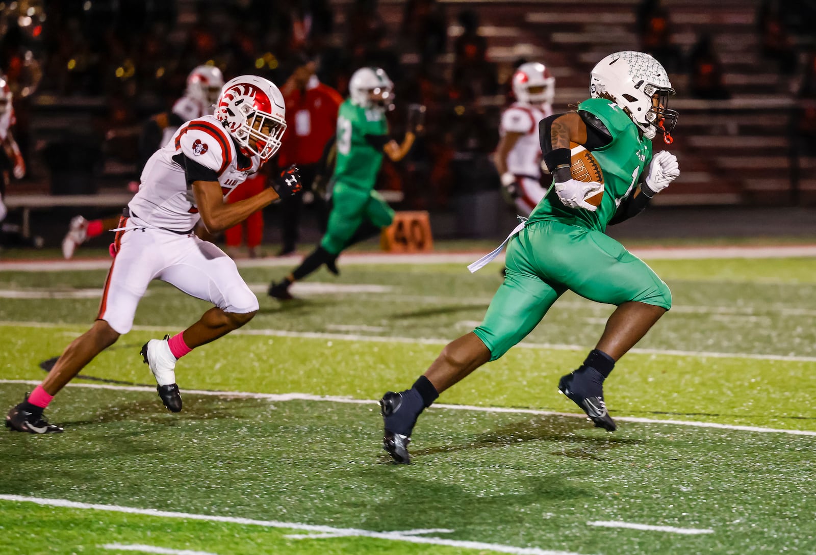 Badin's Lem Grayson runs the ball for a touchdown during their Division II playoff football game against Trotwood-Madison Friday, Nov. 1. 2024 at Fairfield Alumni Stadium. Badin won 14-12 to advance. NICK GRAHAM/STAFF