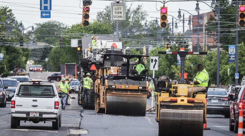 Crews continue to repave Ohio 48 in Kettering, a $1.2 million Ohio Department of Transportation project covering about 1.5 miles.  Jim Noelker/Staff
