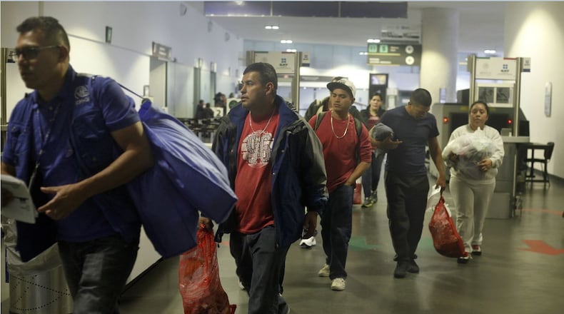 Mexican citizens arrive to the airport in Mexico City, Thursday, Feb. 23, 2017, after being deported from the U.S. While U.S. Homeland Security Secretary John Kelly and U.S. Secretary of State Rex Tillerson tried to alleviate Mexico’s concerns during a visit to Mexico City, President Donald Trump was fanning them further with tough talk about “getting really bad dudes out of this country at a rate nobody has ever seen before.” (AP Photo/Marco Ugarte)